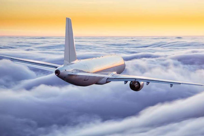 منظره غروب خورشید و هواپیما