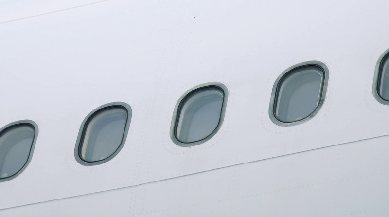 چرا پنجره هواپیما گرد است؟