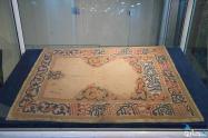 کرمان، نمد، جنس: پشم، قرن ۱۱ هجری قمری (از قدیمی‌ترین آثار به نمایش در آمده در موزه فرش ایران)  