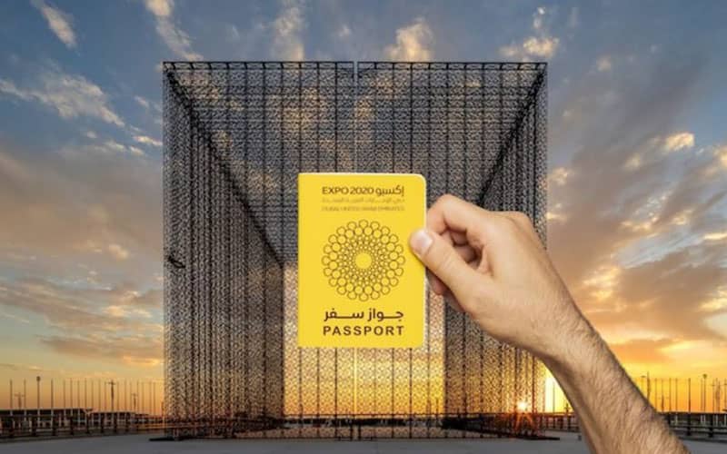 پاسپورت زردرنگ دبی با پس زمینه سازه ای توری شکل