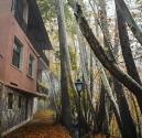 ویلای روستای اوره در جوار درختان بلند از نمای کنار ساختمان