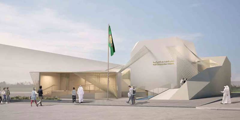 عکسی از یک سازه سفید رنگ با پرچم سبزی در مقابل آن