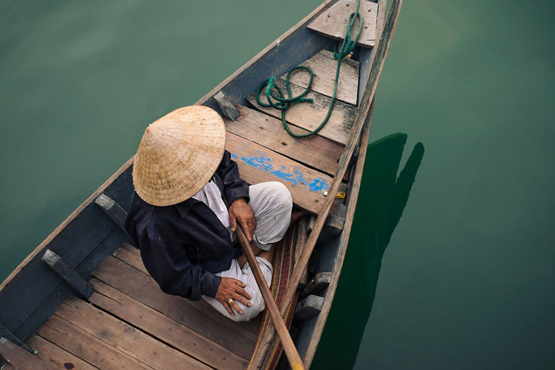 مرد ویتنامی در قایق