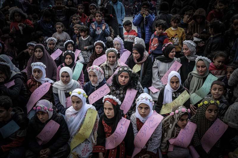 مراسمی برای ۴۰ دانش آموز حافظ قرآن در مدرسه شفا امر (Shafa Amr)، پناهگاه فلسطینیان در نوار غزه