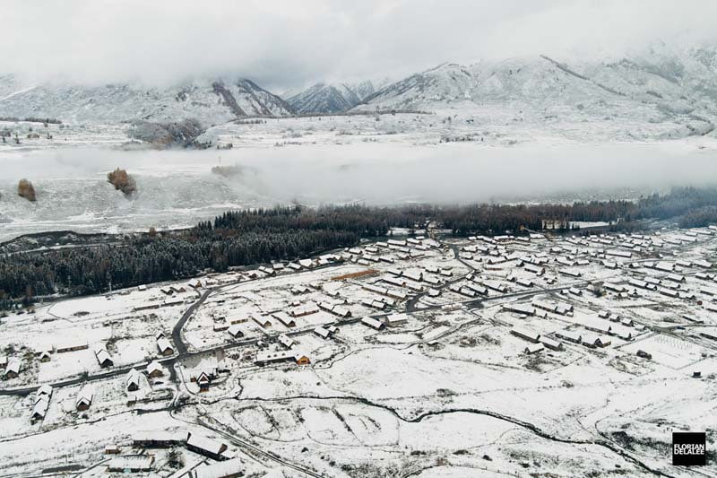 عکس هوایی از یک روز برفی در روستای همو در چین